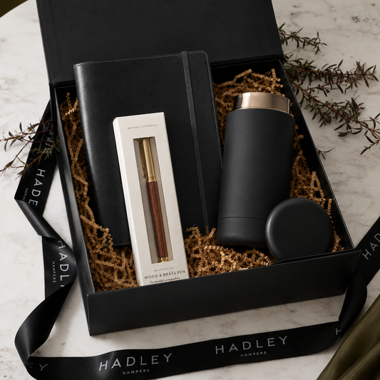 The Executive gift hamper with black journal, brass pen and coffee tumbler