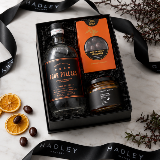 Four Pillars gin gift hamper with dried orange and dark chocolate almonds